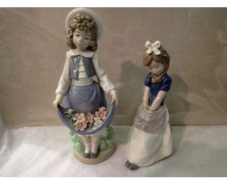 Two Nao figurines. P&amp;P Group 2 (£18+VAT for the first lot and £3+VAT for subsequent lots) 