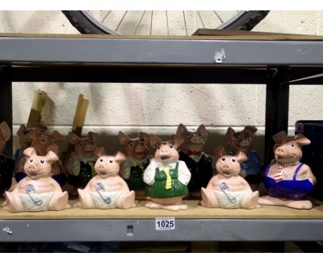 Twelve Wade NatWest pigs all with stoppers. P&amp;P Group 3 (£25+VAT for the first lot and £5+VAT for subsequent lots) 
