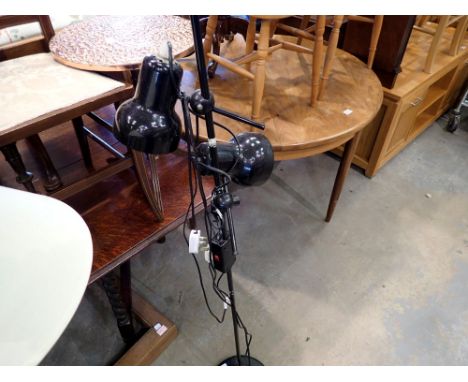 Black standard lamp with two spotlight type heads. Not available for in-house P&amp;P 