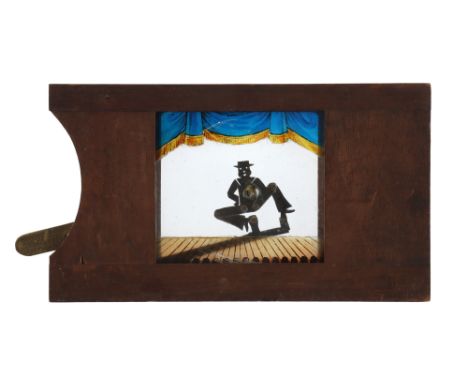 Magic Lantern Slide of a Dancing Sailor, Mahogany fremed slide, stamped 'REGISTERED' the slide with a hand painted stage, in 