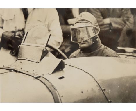 1930;s Motor Sport Sir Malcolm Campbell, Period photograph of Sir Malcolm Cambell sitting in a racecar, 1930's mounted on per