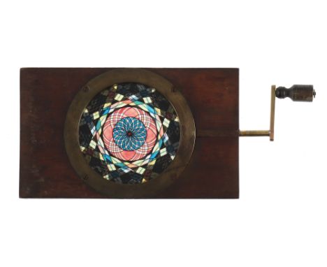 A ‘Chromotrope’ Hand-Painted Rackwork Magic Lantern Slide, A ‘chromotrope’ hand painted rackwork magic lantern slide. works w