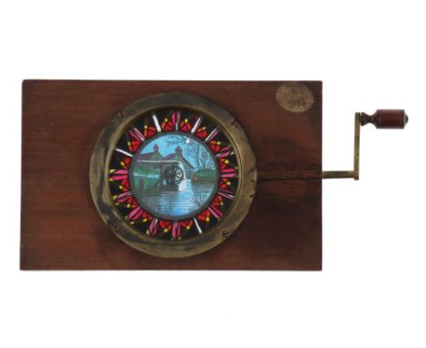 A Hand Painted Chromotrope / Watermill Rackwork Magic Lantern Slide A hand painted chromotrope / watermill rackwork magic lan