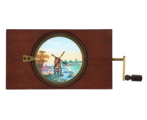 A Hand-Painted Windmill Magic Lantern Slide, windmill’ hand painted rackwork magic lantern slide. works well. measuring 7” x 
