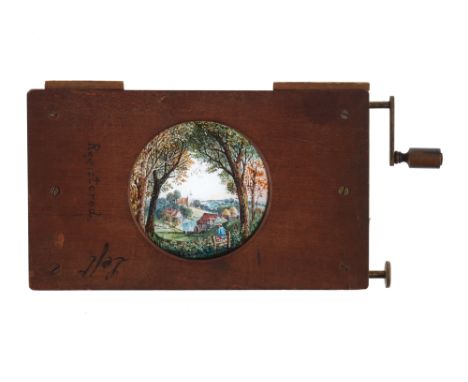 Magic Lantern Slide of a Rural Scene With a Curtain, the mahogany framed slide with a detailed hand-painted image of a countr
