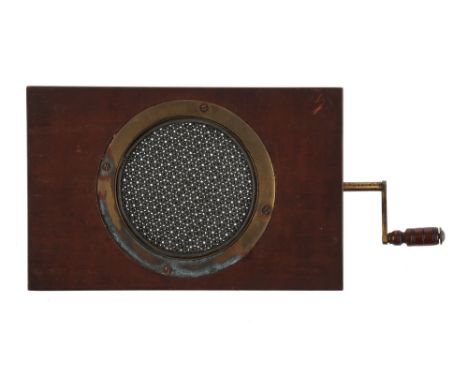 A ‘Eidotrope’ Rackwork Magic Lantern Slide, A ‘eidotrope’ rackwork magic lantern slide, the slide produces a zoom-in/out effe