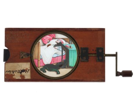 A ‘Man Eating Rats’, Hand-Painted Rackwork Magic Lantern Slide, A ‘man eating rats’, hand painted rackwork magic lantern slid