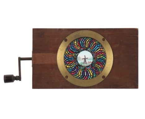 Handpainted Windmill chromatrope Magic Lantern Slide, A ‘windmill / chromotrope’ hand-painted contra-rotating rackwork magic 