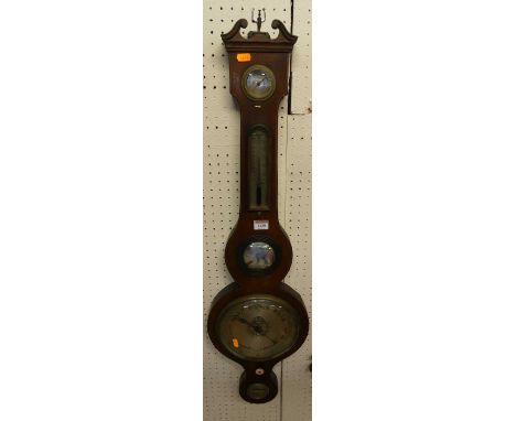An early 19th century mahogany four-dial wheel barometer, the lower scale signed E. Jones, Wantage, h.98cm