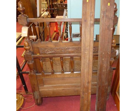 A circa 1900 Belgian floral relief carved oak single bedstead, having side rails