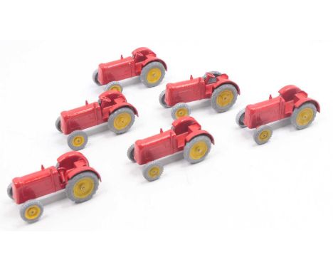 Six Charbens tractors, comprising a red body, yellow hubs, and grey tyres, all unboxed examples, three have damage to the ste