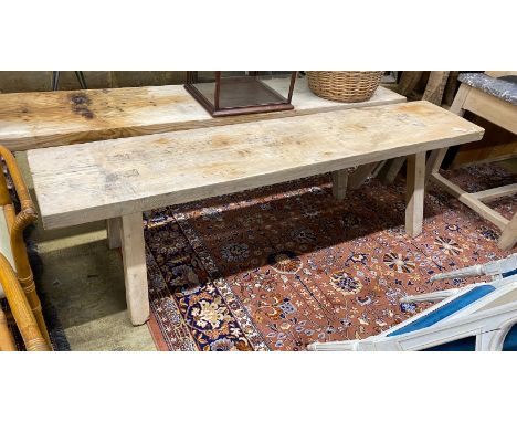 A rectangular Provincial pine bench, length 215cm, depth 43cm, height 60cm