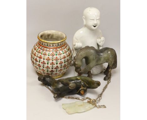 A 19th century Chinese pale celadon jade pendant a Chinese blanc de Chine figure, two soapstone horses and an Indian vase, fi