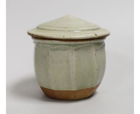 Richard Batterham (1936 – 2021), a cut sided stoneware jar and  pointed cover with sage coloured glaze. 10.5cm high