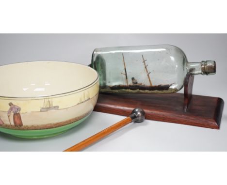 A Royal Doulton series ware bowl, a ship in a bottle and a Gordon Highlanders white metal mounted swagger stick