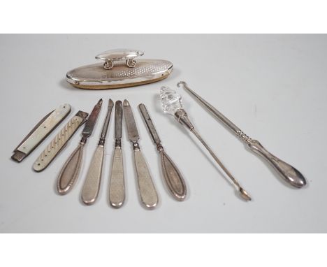 A small group of assorted manicure items and a leather travelling case containing a matched silver and mother of pearl travel