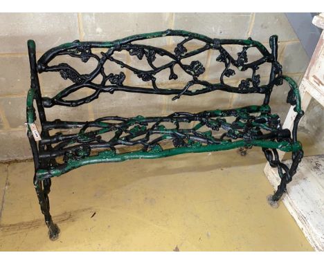A Victorian Coalbrookdale style cast iron garden bench, length 124cm, depth 57cm, height 77cm