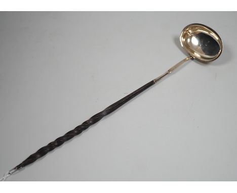 An early 19th century silver toddy ladle with demi barley twist baleen handle, maker IS?, maker's mark and duty mark only, 36