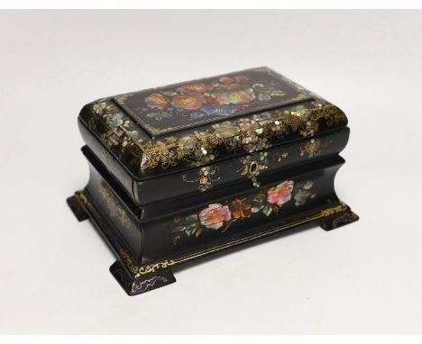 A Victorian painted and mother of pearl inlaid papier mache tea caddy. 23cm wide