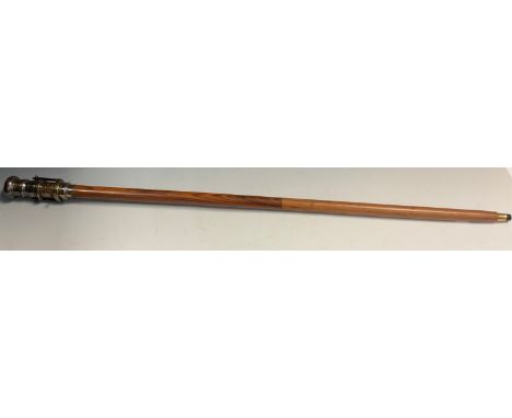 A novelty Dolland Replica 1920s style walking stick, the handle as a spotting scope/compass, tapering shaft, 98cm long. 