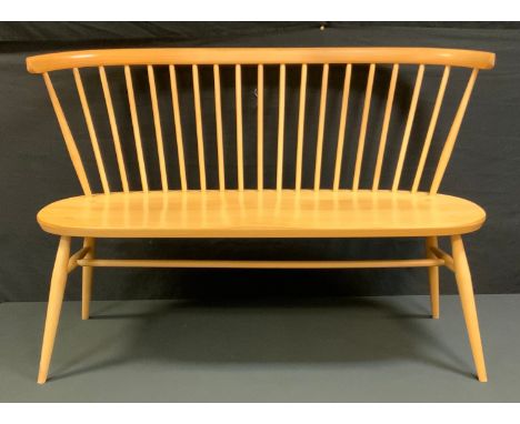 An Ercol Originals light ash love seat, stick back, tapering legs, H stretcher, 112cm wide. 