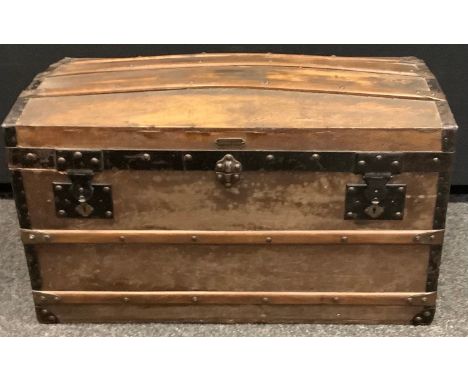 A wood and metal bound dome top trunk circa 1890 