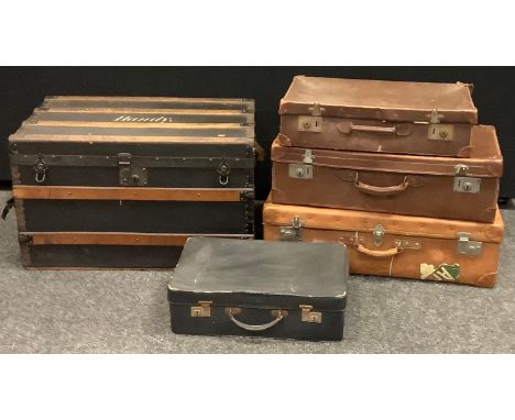 A F.E Miggins metal and wood bond traveling trunk, rectangular hinged top, carrying handles, 45cm high, 76cm wide, 48cm deep;