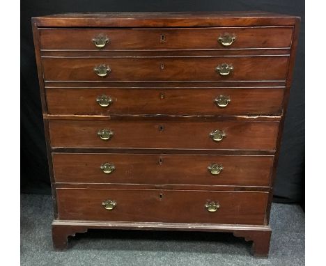 A George III mahogany secretaire chest, caddy top, three faux drawer front opening to fitted interior, three cockbeaded, grad