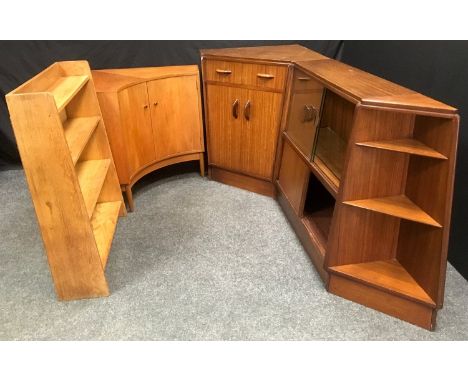 An E. Gomme retro teak corner bureau with secretaire drawer over two door cupboard, matching sliding door bookcase and corner