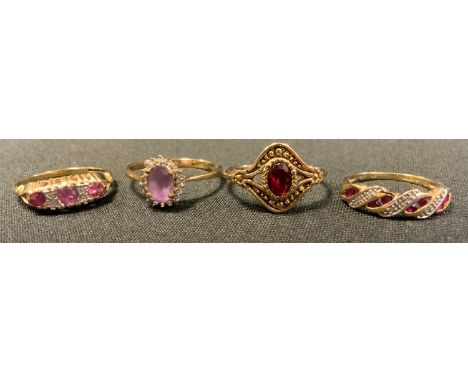 Rings - a diamond and ruby line ring;  others, all 9ct gold shanks. 