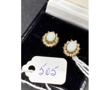 A pair of diamond and opal earrings 9ct    2.3 gms