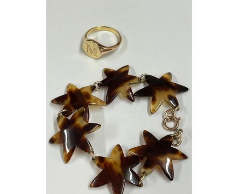 Faux tortoishell bracelet on yellow metal clasp and signet ring