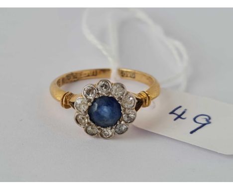 A sapphire and diamond cluster ring 18ct gold size N    