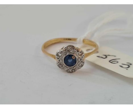 A sapphire and diamond cluster ring 18ct gold size K    1.6 gms