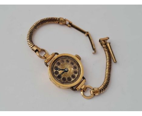 ROLEX – a vintage ladies18ct Rolex watch appears working needs glass
