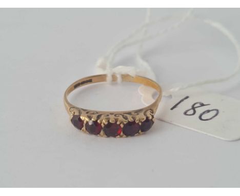 A garnet five stone ring 9ct size  L   1.6 gms