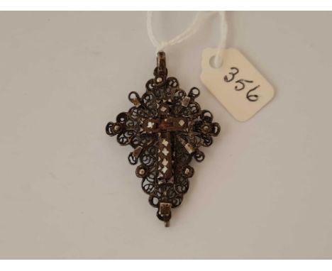 Antique 18th century filigree cross set with a smaller wooden cross with Mother of Pearl detail.