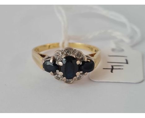 A sapphire and diamond cluster ring 18ct gold size Q    3.7 gms