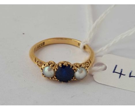 A sapphire and pearl ring 18ct gold size N    3 gms