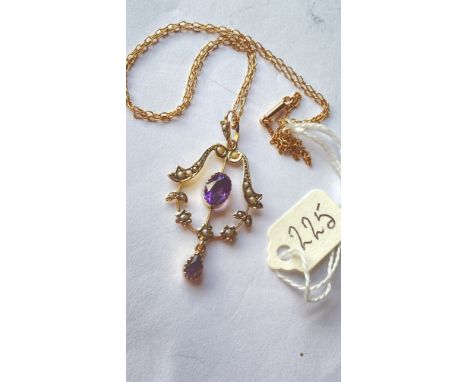 A good Victorian amethyst and pearl pendant with original chain