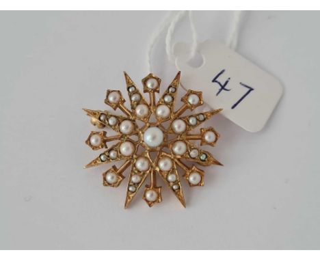 A PEARL SET STAR BROOCH 9CT    5,4 GMS