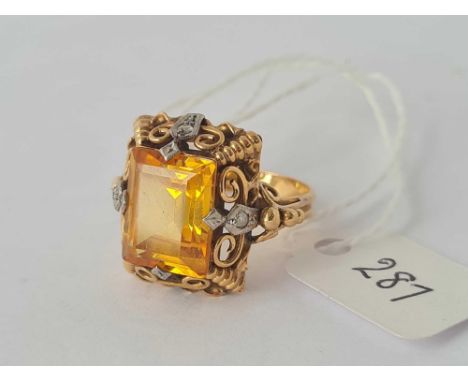 A fancy orange stone dress ring 18ct gold size M    5.2 gms