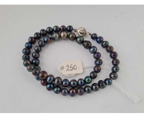 A unusual black pearl necklace