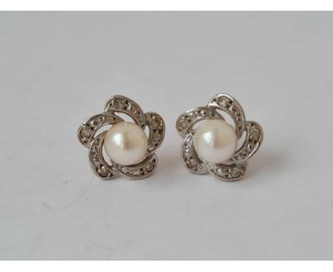 A pair of pearl set earrings 9ct   2 gms