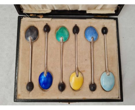 Boxed set  of 6 bean topped coffee spoons with enamel decoration. Birmingham 1924