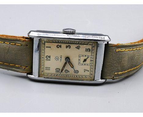 JUNGHANS VINTAGE ARMBANDUHR, rechteckiges und leicht anatomisch gebogtes silberfarbenes Gehäuse, elfenbeinfarbenes Zifferblat