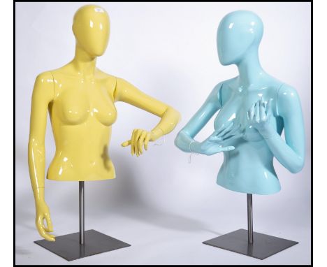 A pair of very good quality contemporary shop haberdashery tailors dummy - mannequins each raised on polished steel plinth ad