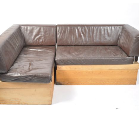 A pair of 20th century retro oak and leather modular corner sofa's . The squared oak plinth bases with leather upholstered se