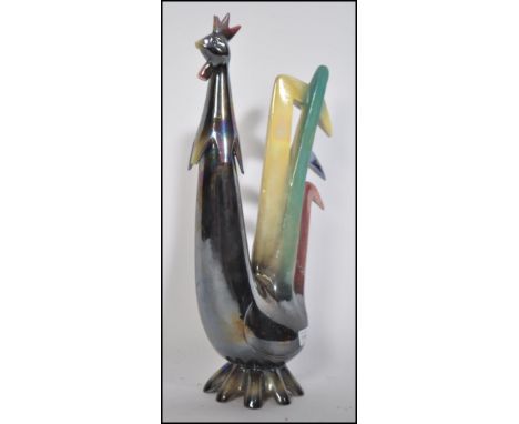 A 1970's unusual ceramic retro - abstract lustre glazed figurine of a cockerel &nbsp;by Jema of Holland. Marked to the unders