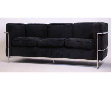 After Le Corbusier. An unusual childs ' LC2 ' type black suede and chrome 3 seat sofa settee The polished chrome tubular fram